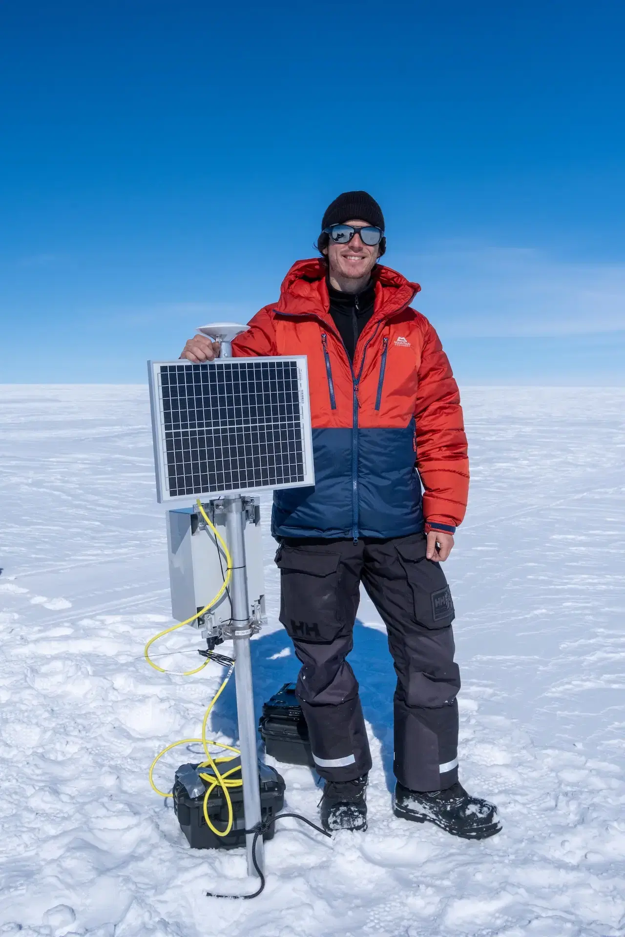 Andrew Tedstone with a deployed Cryologger GVT.