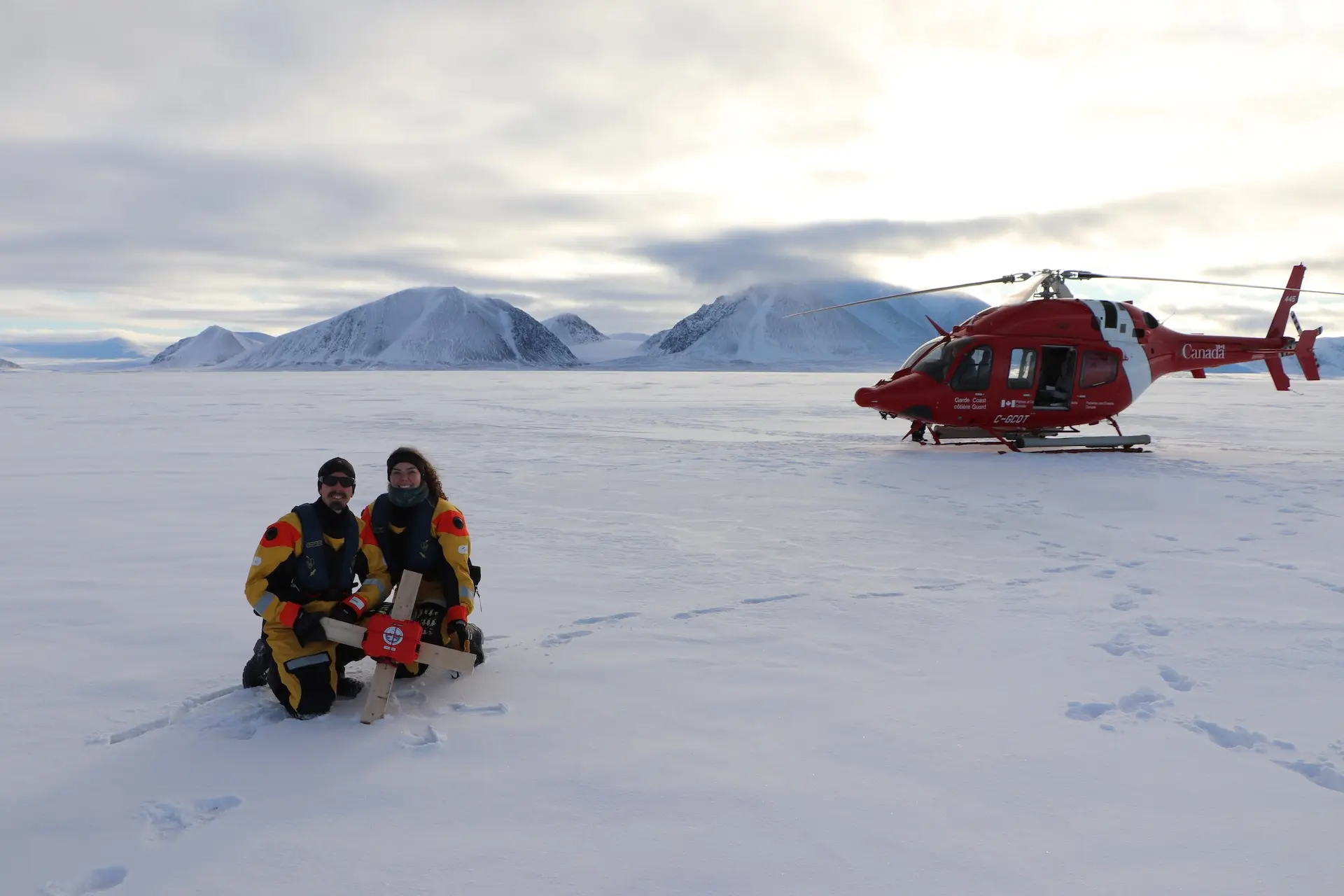 Adam Garbo and Erika Brummell deploying a Cryologger ITB from the Amundsen
helicopter onto a drifting ice island