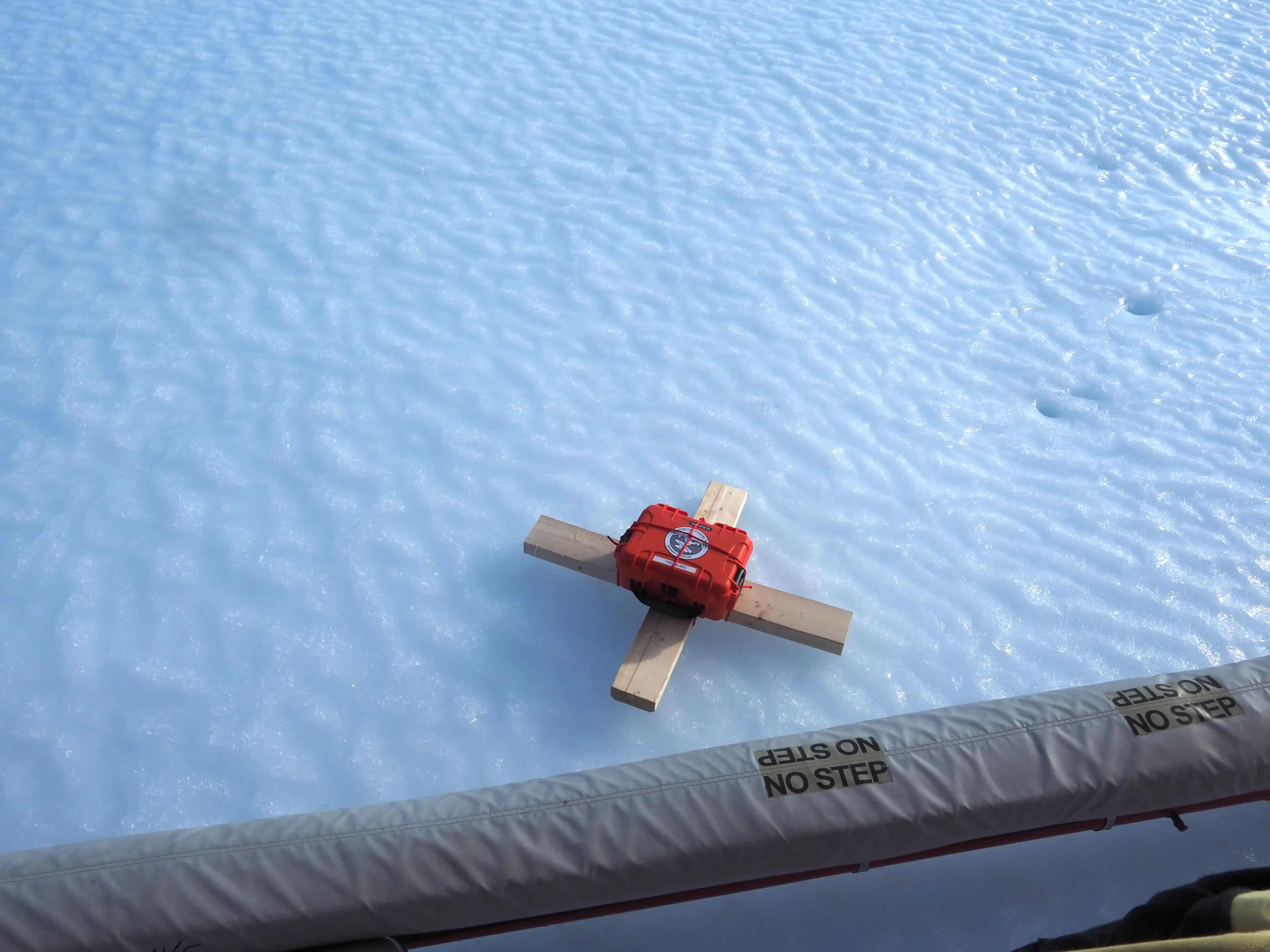 Cryologger Ice Tracking Beacon deployment on the Petermann ice island